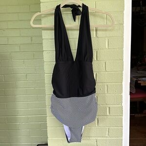 Swimsuit, one-piece black and white with light tummy control and gathered sides